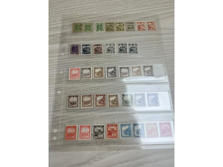 holding in 8 album pages, including the rare 2nd Regular Issue 15c mint. Large quantity. Please view.